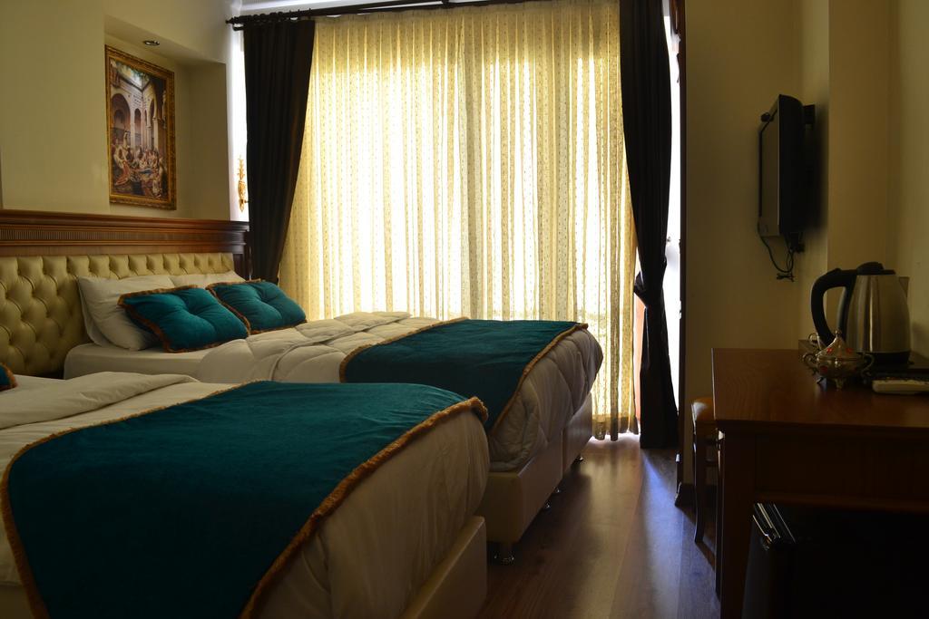 Blue Istanbul Suites Quarto foto